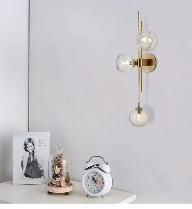 Aurélia Wandlicht, klarer und grüner Glasschirm, goldfarbenes Finish, fest verdrahtet, Licht nach oben und unten